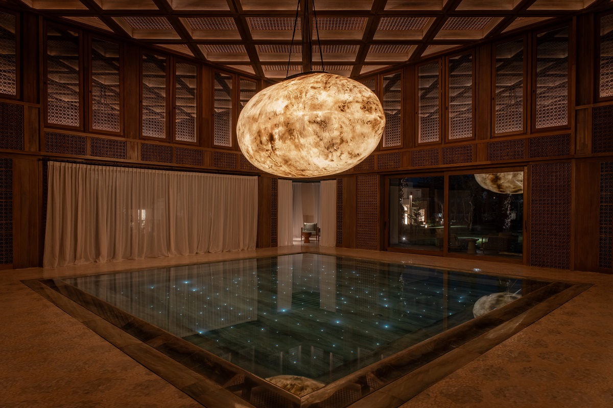 full moon pendant light over spa swimming pool