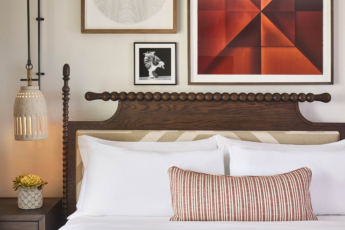 bed detail with wooden headboard in The Ritz-Carlton Bacara