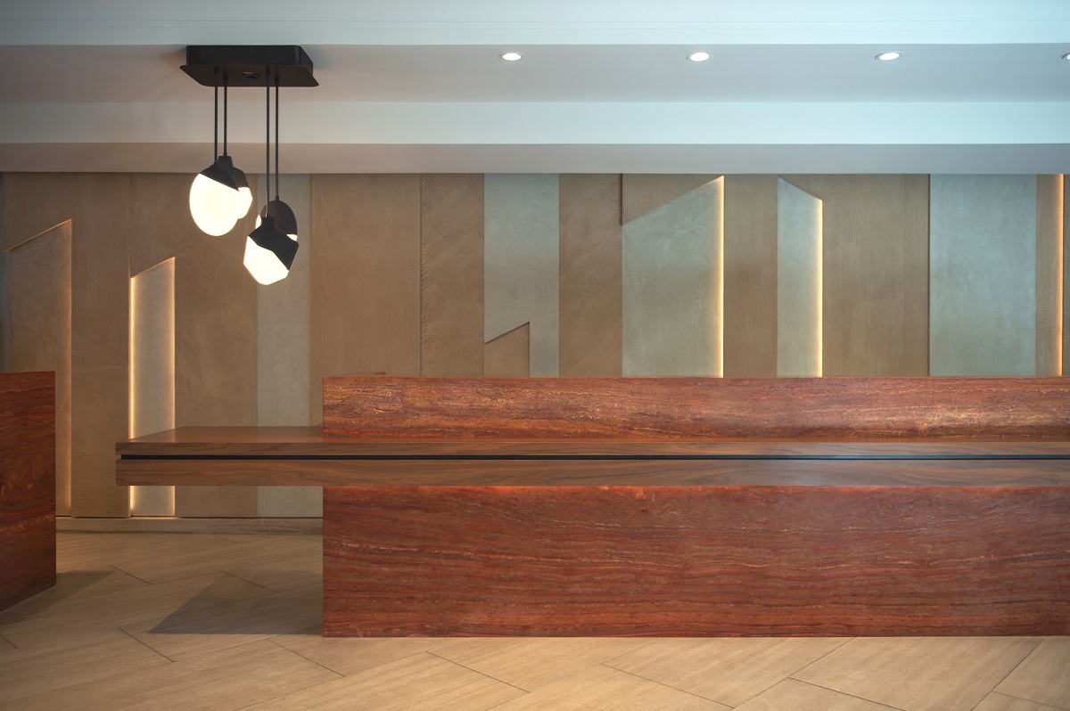 reception space with bold block desk in shades of the desert in Grand Hyatt Scottsdale Resort.