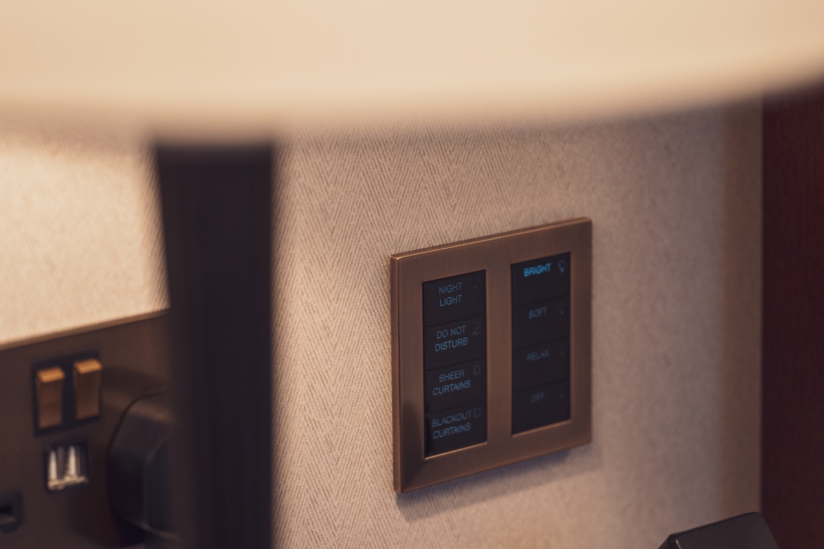 Antique brass Palladiom keypads offer 21st-century room control in a sleek, timeless aesthetic, combining form and function in perfect harmony. Photo courtesy Link Media Systems.