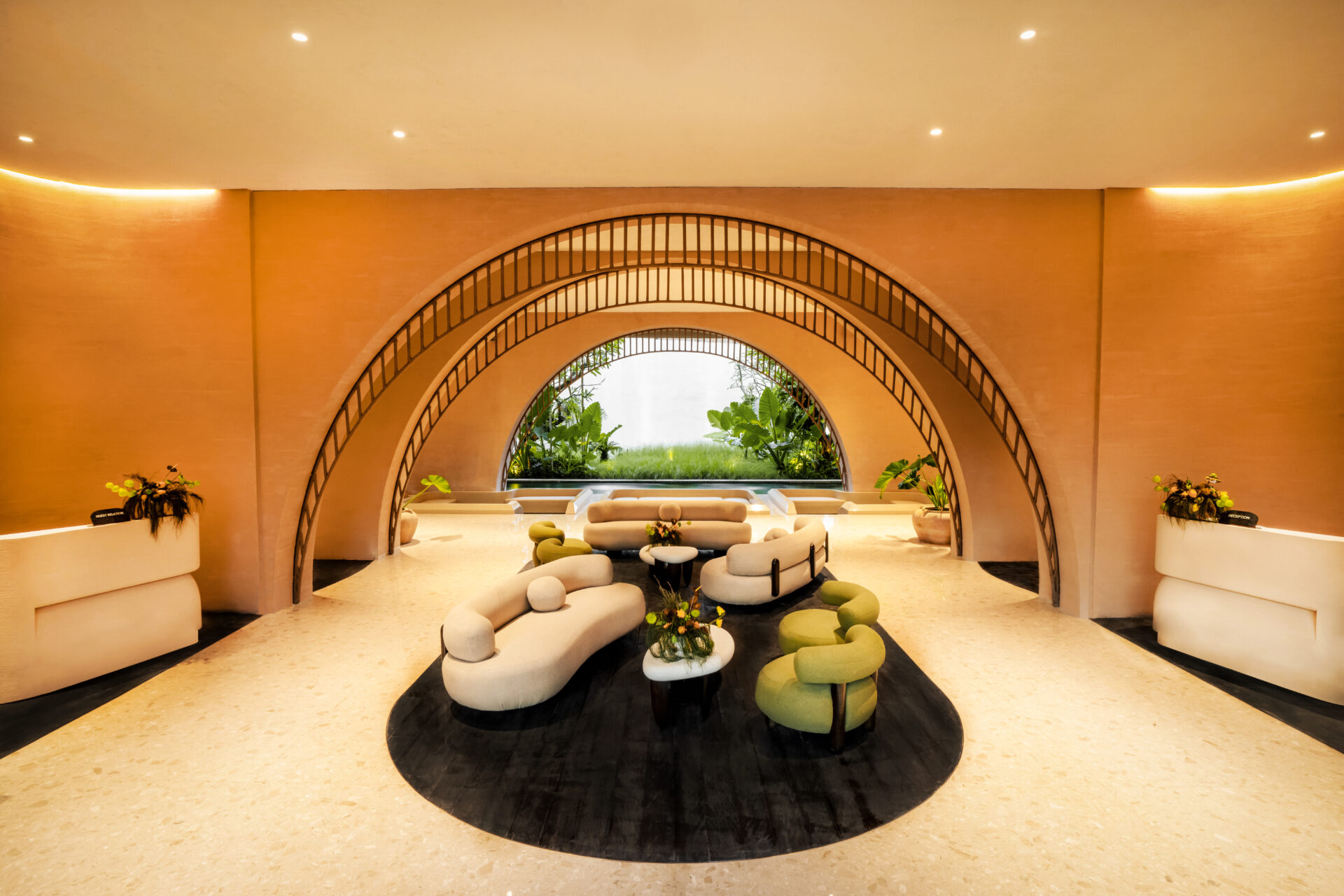 Noema, Bali hotel domed lobby area with central seating and arced window. August hotel opening