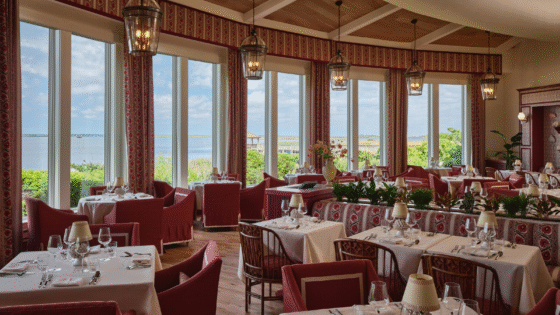 Restaurant area in burgundy colour at Sanderson Resort