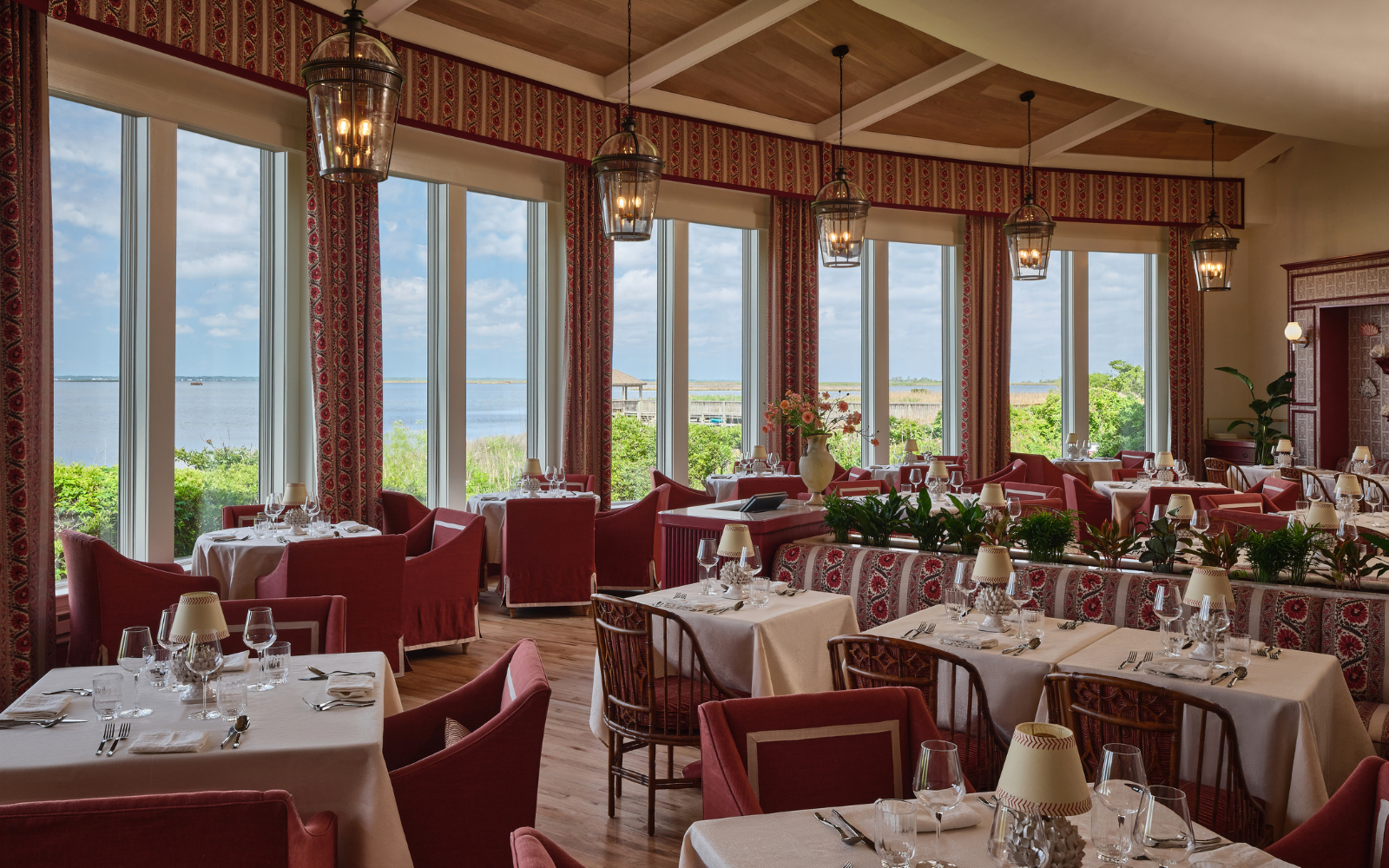 Restaurant area in burgundy colour at Sanderson Resort