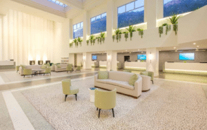 Corian curtain wall in white lobby space