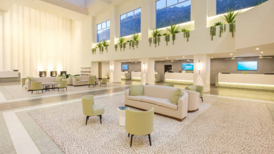 Corian curtain wall in white lobby space