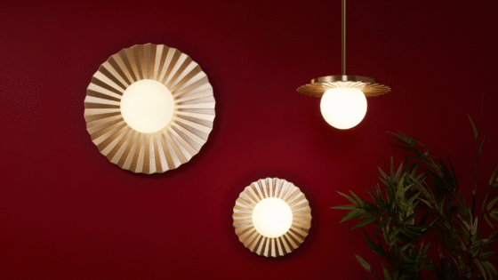 Vistal lighting collection, one pendant and two wall lights with metal sunbeam accents