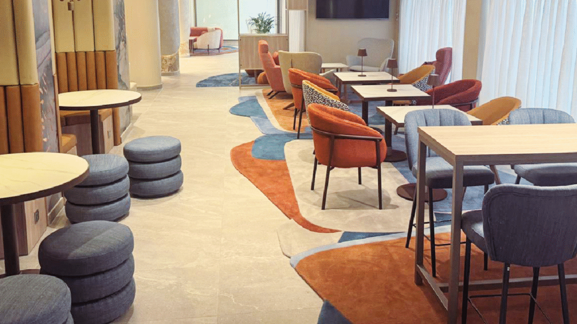 Luxury Carpet Studio orange and blue rugs in lobby area of marriott hotel