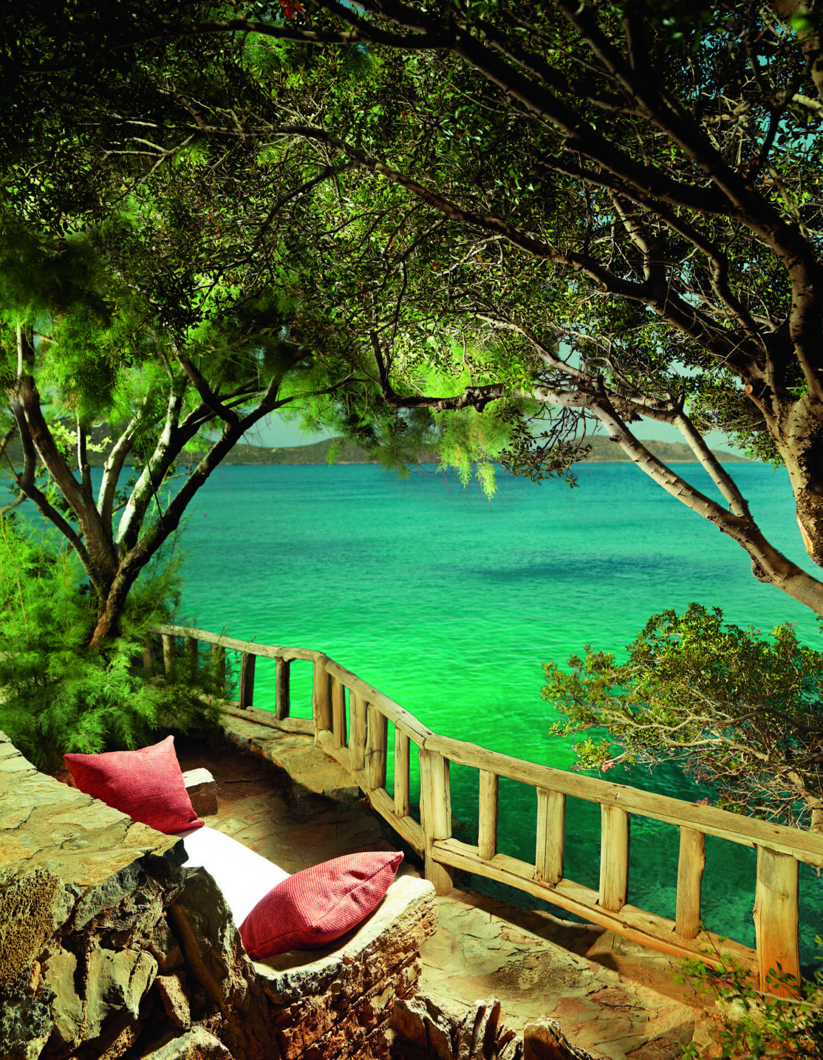 Seated area at ELounda Collection overlooking the ocean