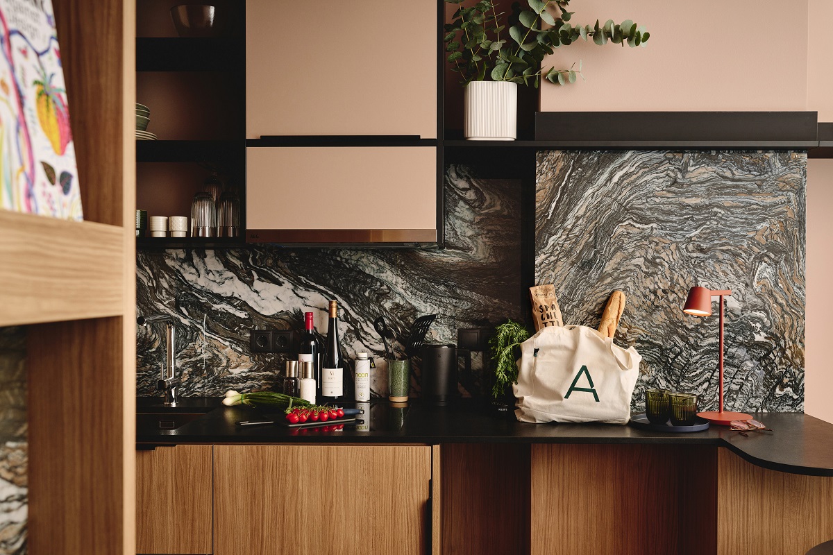 kitchen corner in guestroom with marble splashback