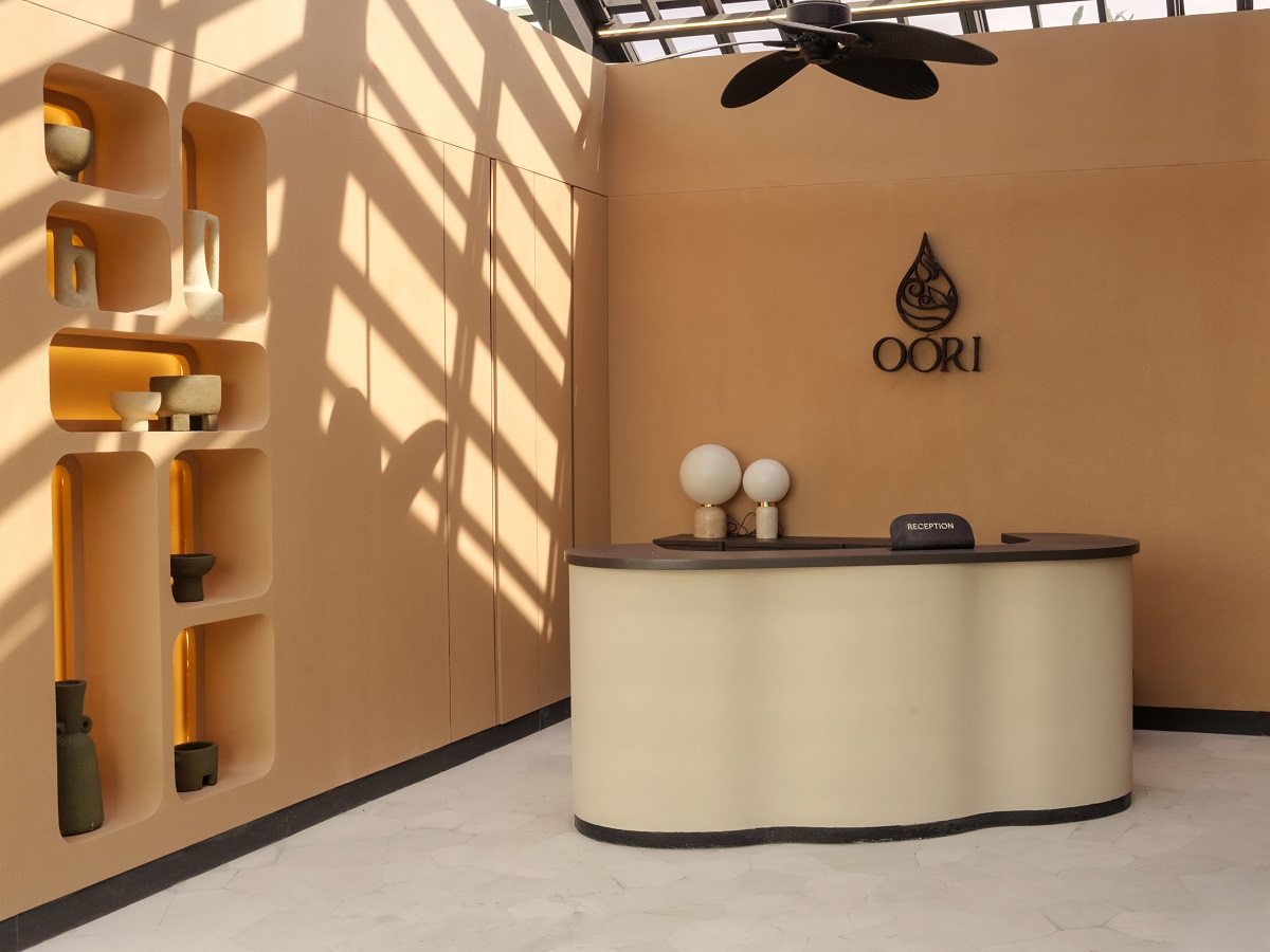 organic shaped reception desk and wall niches in Oori Spa in Noema