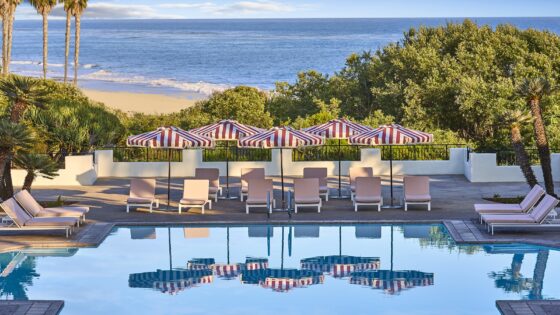 sea view and pool detail with red and white striped umbrellas at The Ritz-Carlton Bacara, Santa Barbara
