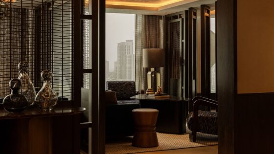 Rosewood doha seating space in clubhouse lounge with view across Doha