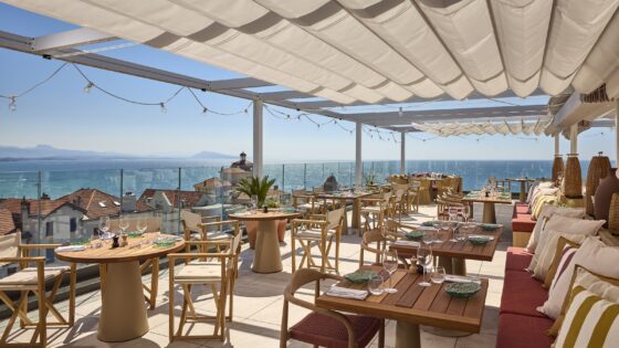 roof terrace with sea view under white shade cloth at Talaia Hotel Spa Biarritz