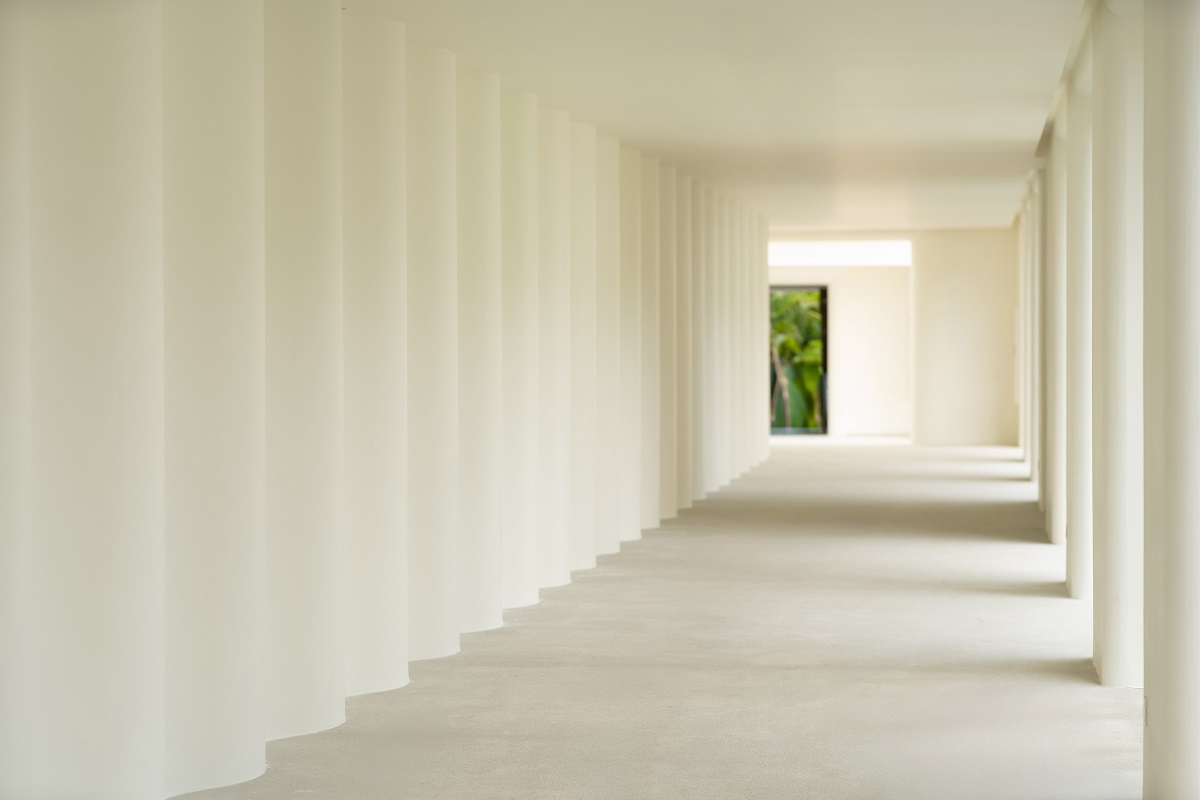 white arches leading into The Standard, Pattaya Na Jomtien - Lobby Transition