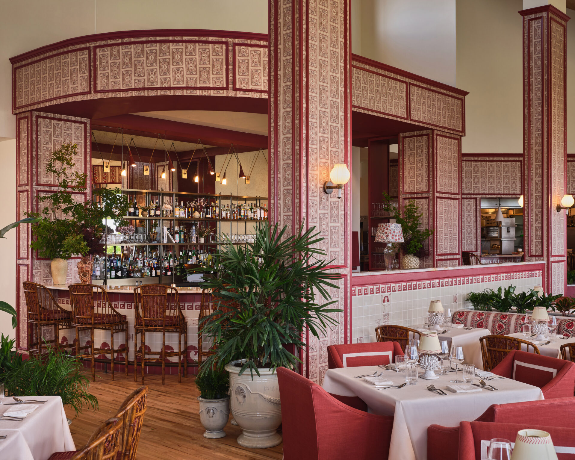 Pink hued interiors of the Theodosia restaurant at The Sanderling Resort