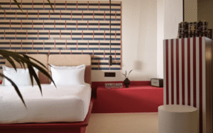 red stripes and natural materials in new boutique retreat Neema Maison Finikia Santorini from domes