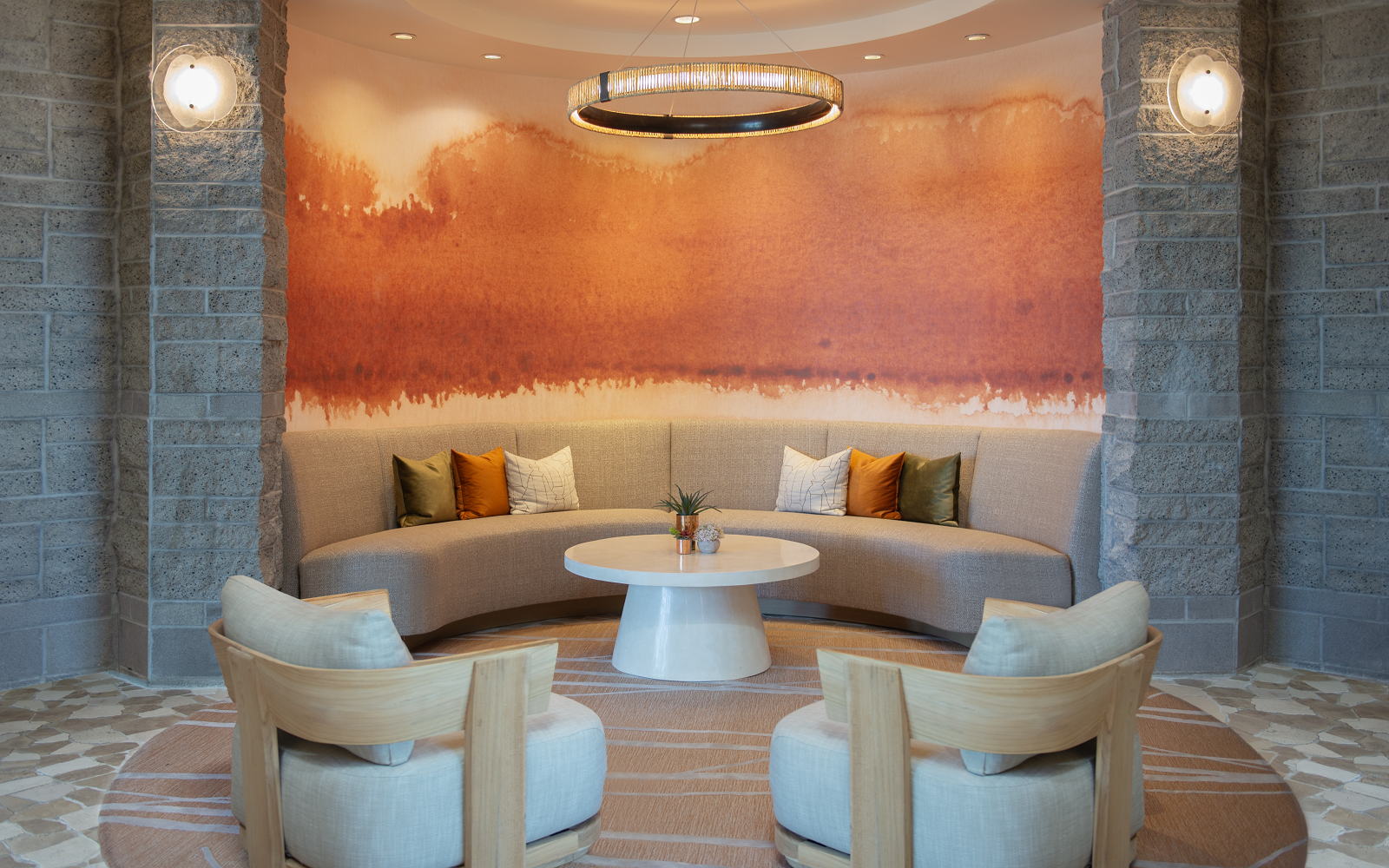 seating in lobby with niche painted in desert colours in Grand Hyatt Scottsdale Resort interiors by Wimberly Interiors.