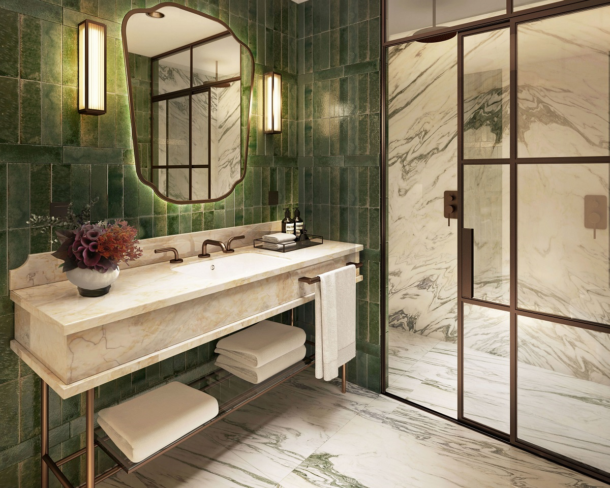 green wall tiles and marble floor in bathroom in Relais San Clemente,