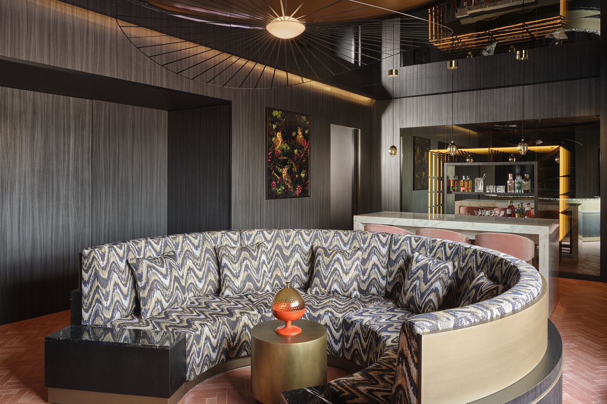 curved banquette seating in public area of W Florence