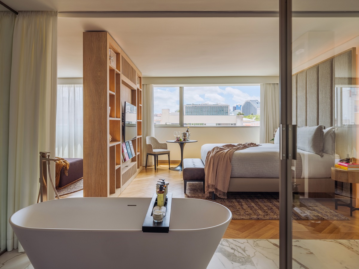 freestanding bath with view of Lisbon skyline in ME Lisbon