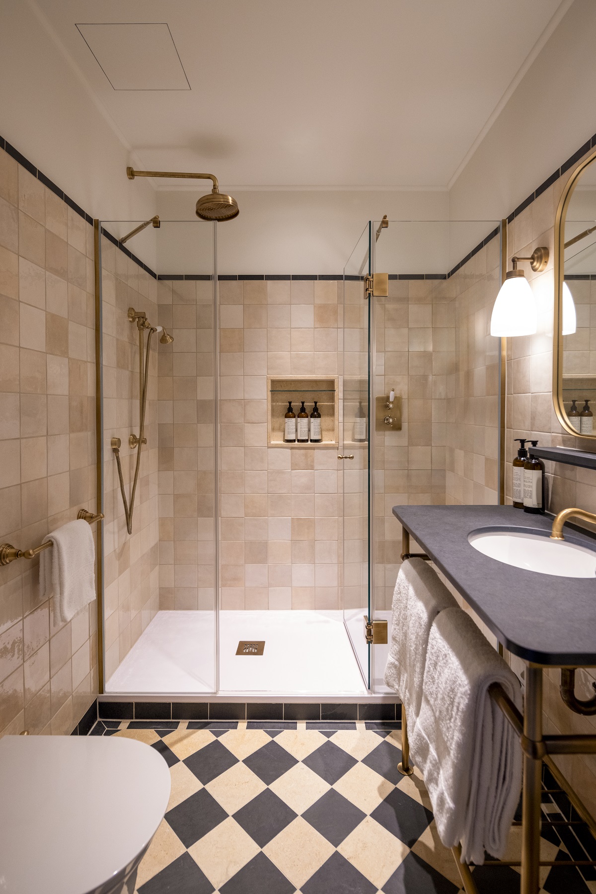 checked floor in ensuite shower and hotel bathroom in Miiro Palais Rudolf