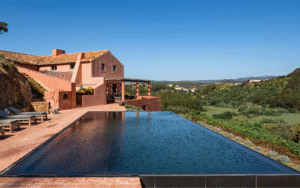 Infinity pool infront of Vale Palheiro Earth Resort, built into Portuguese hillside