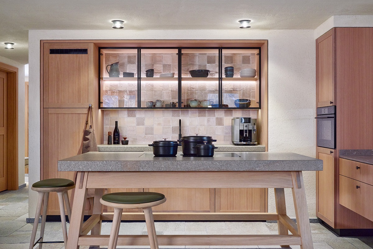wood and stone surfaces in the infinity pool chalet kitchen