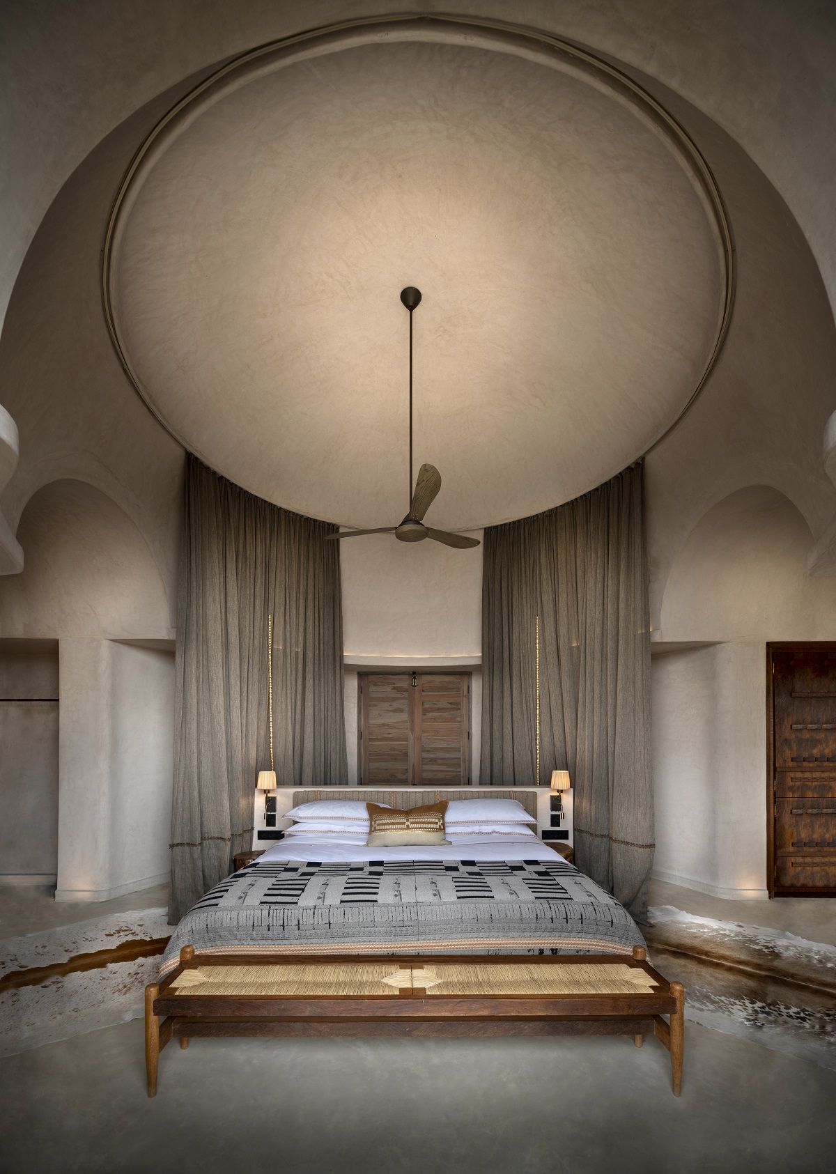 bed under domed ceiling in Suyian Lodge Kenya