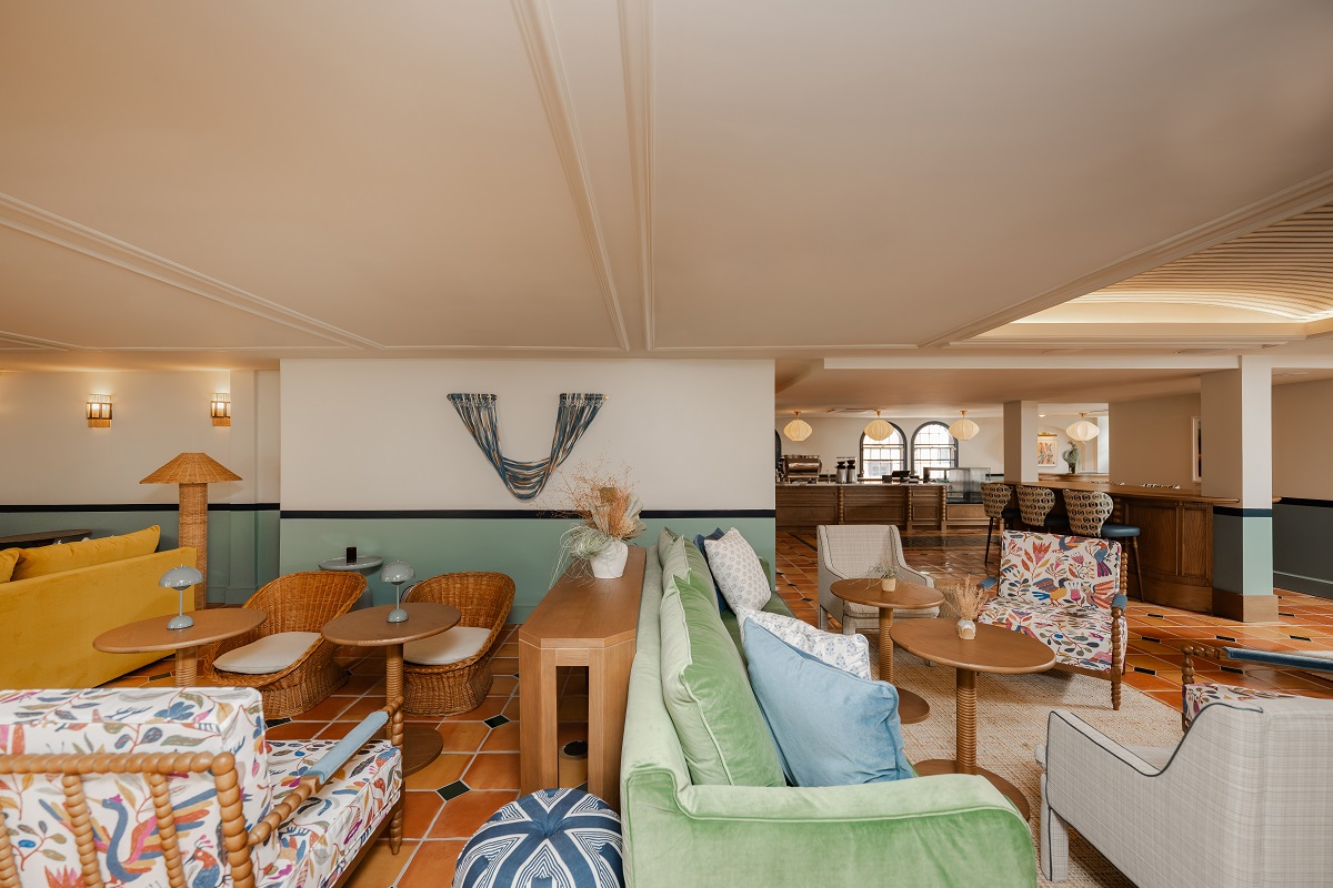 green blue and terracotta on chairs and sofas in the hotel lobby