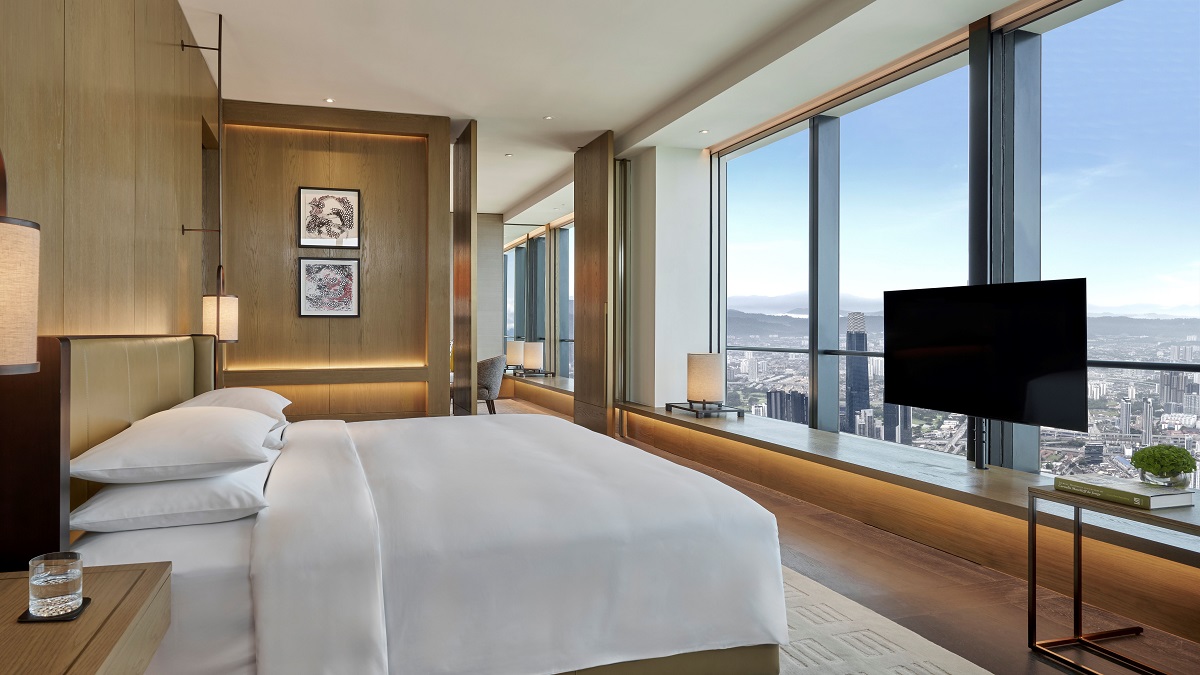 Park Hyatt Kuala Lumpur_Park Suite_Bedroom with skyline city views from the bed