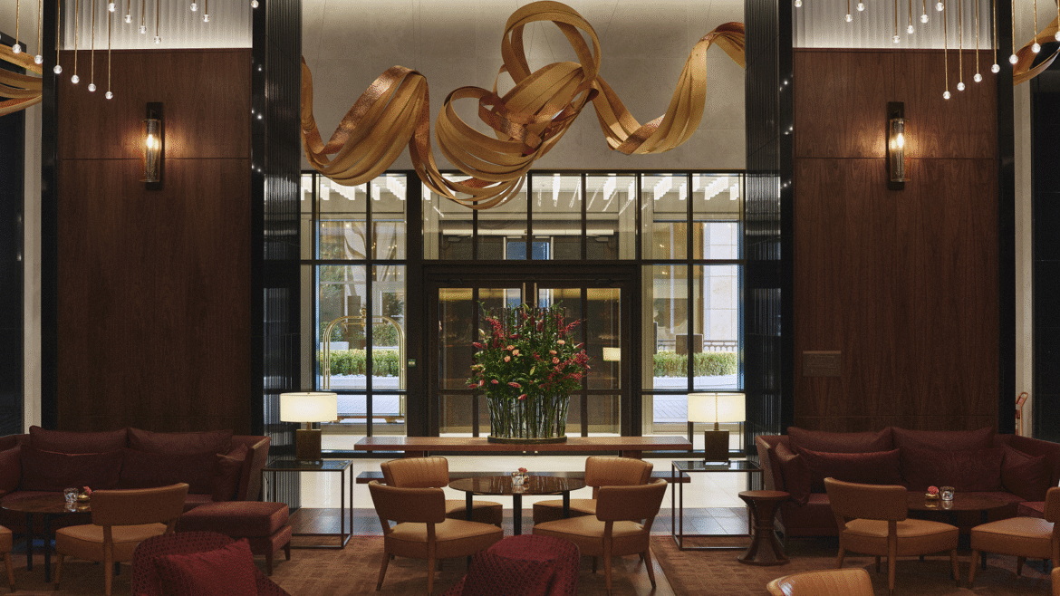 entrance and lobby space in Park Hyatt London River Thames with suspended gold sculpture