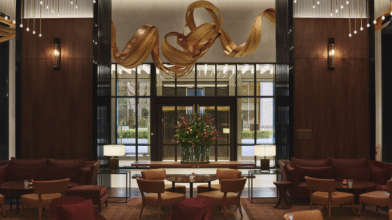 entrance and lobby space in Park Hyatt London River Thames with suspended gold sculpture