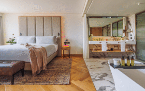 Melia hotels ME Lisbon guestroom with open plan bedroom and bathroom