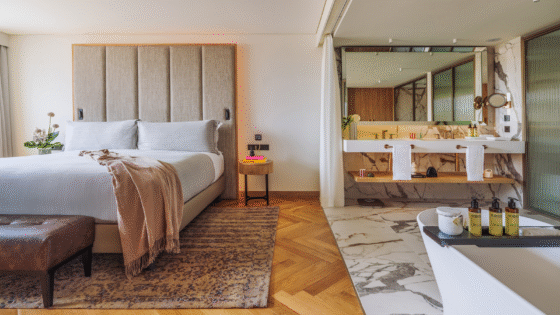 Melia hotels ME Lisbon guestroom with open plan bedroom and bathroom