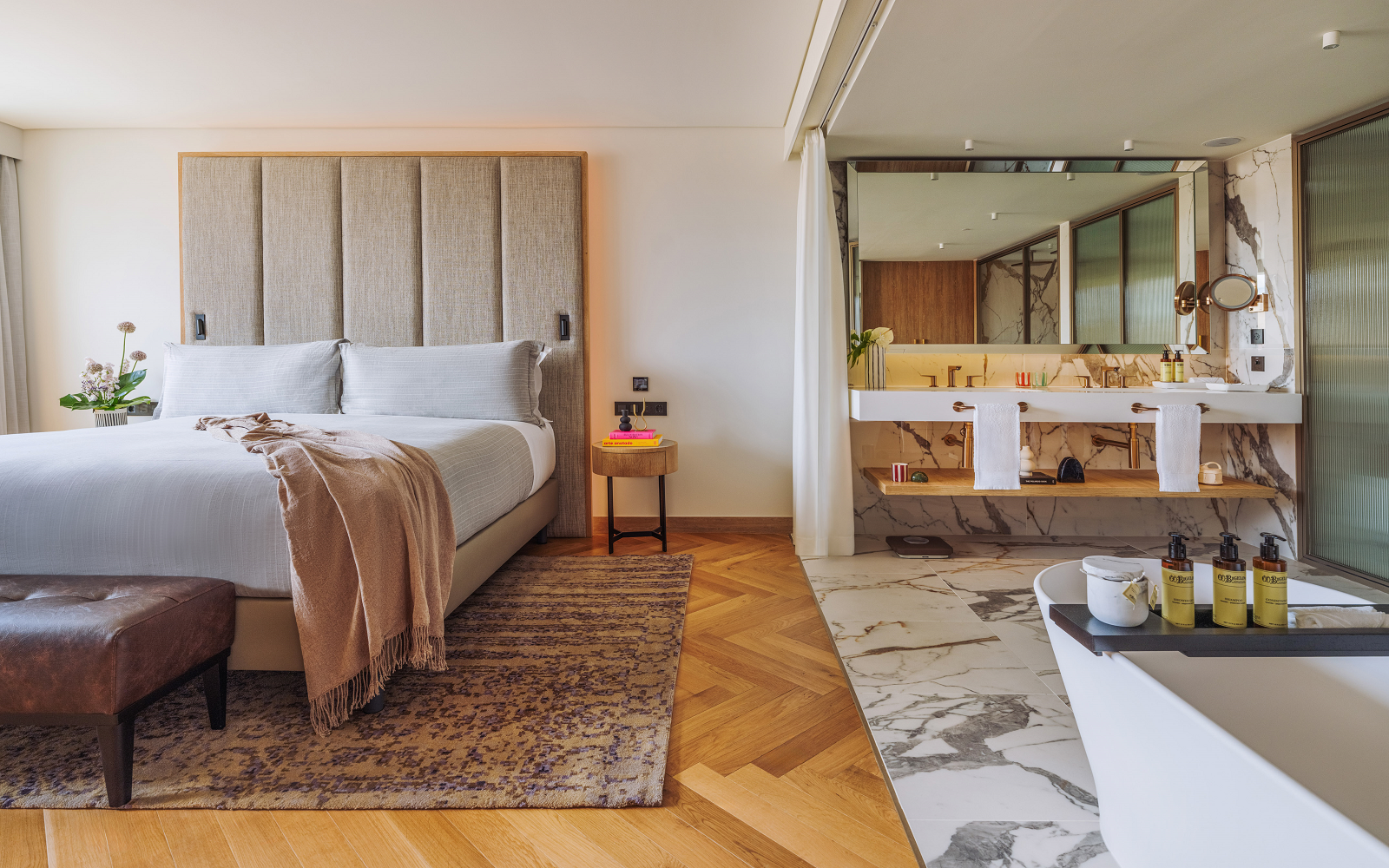 Melia hotels ME Lisbon guestroom with open plan bedroom and bathroom