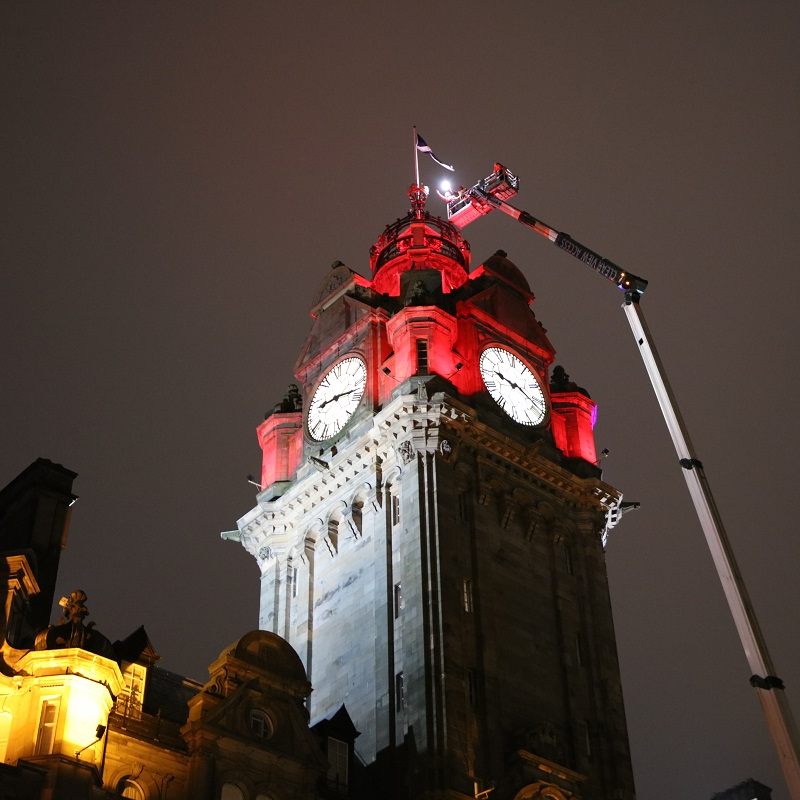 inspection of Balmoral Hotel clock tower at night