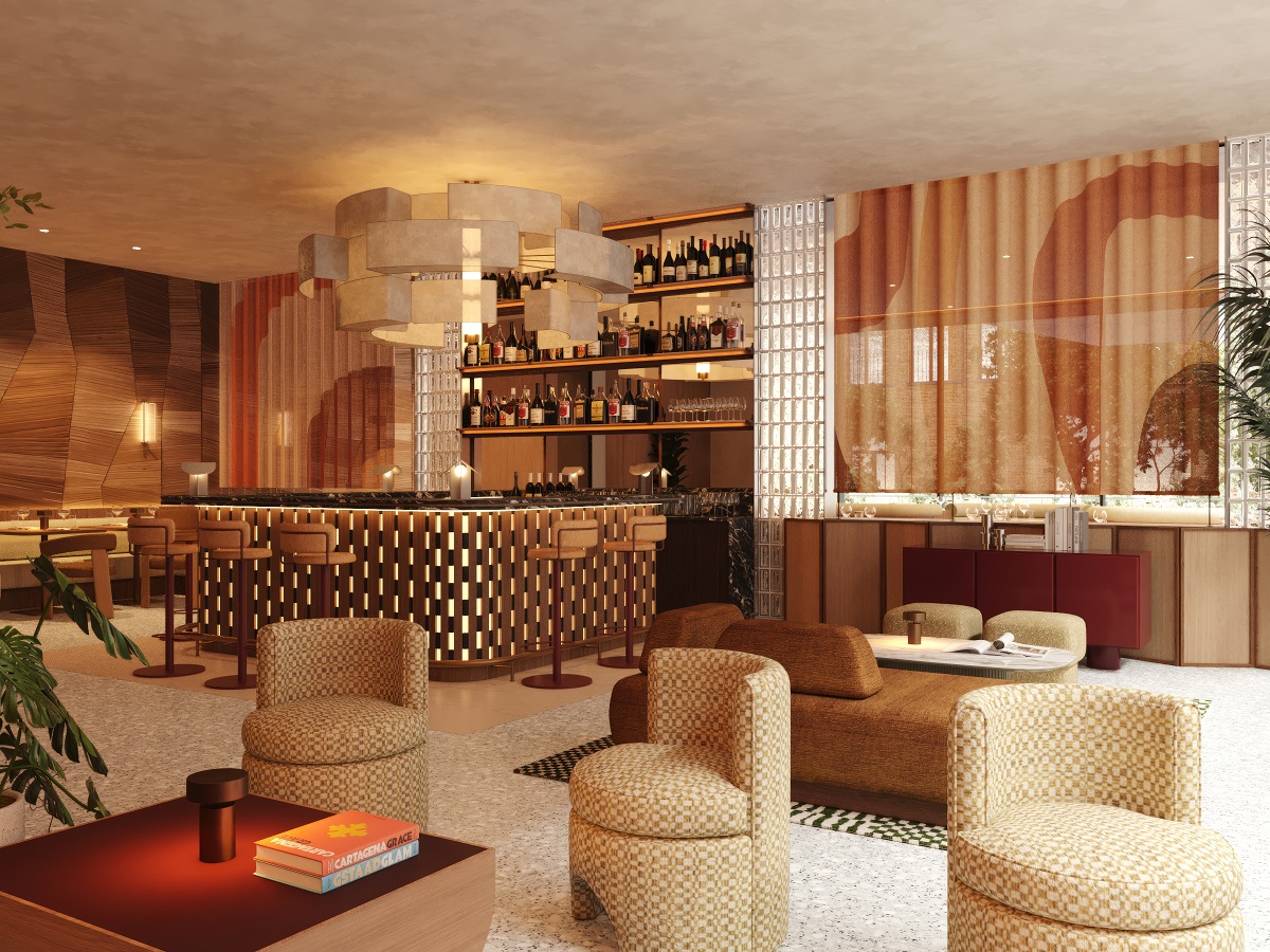 tub chairs around a coffee table in front of bar in wood with copper elements in Aethos London