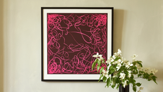Pink and black graphic Richard Allan London silk scarf framed in black