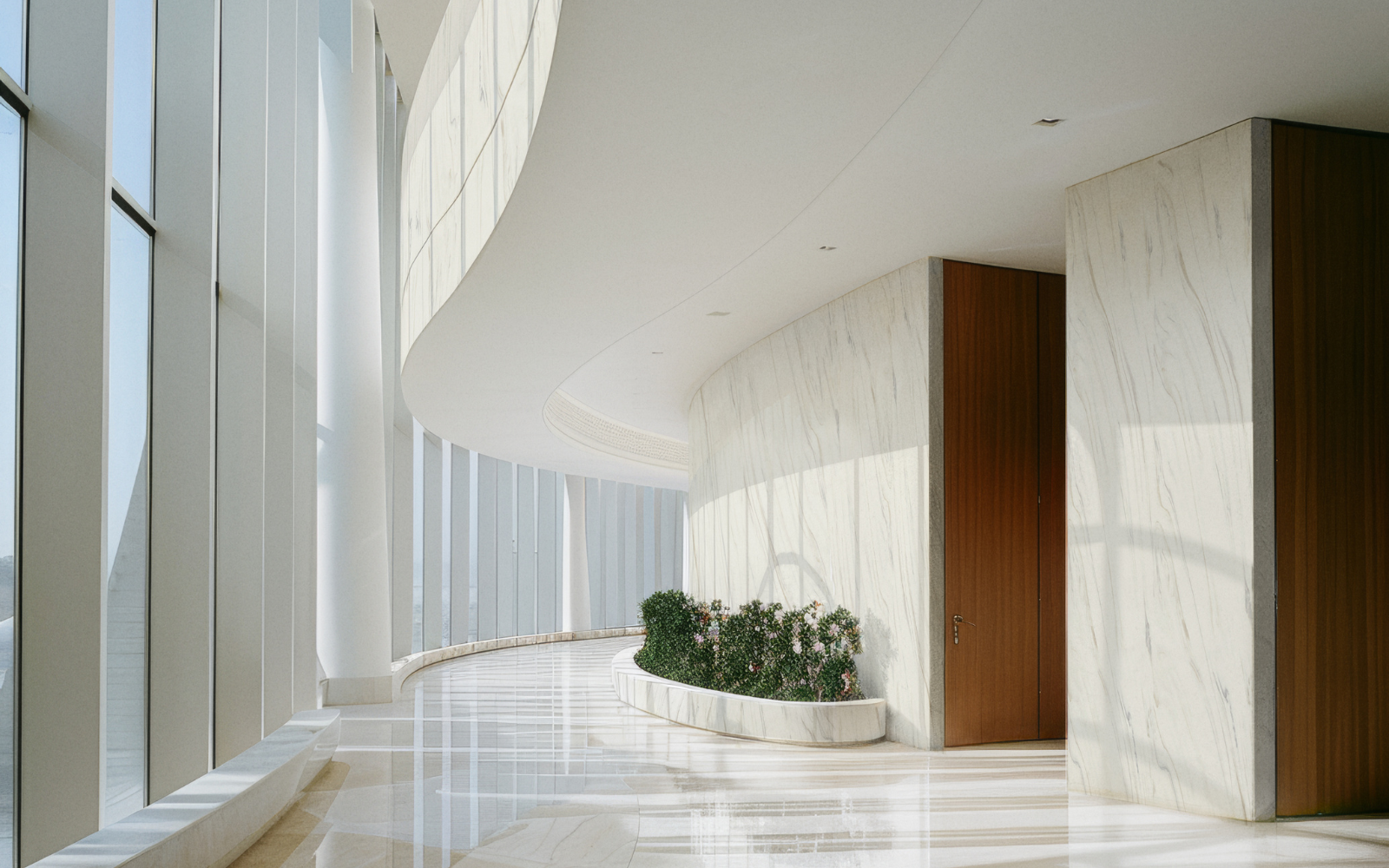 Corian floors and curved Corian walls in white