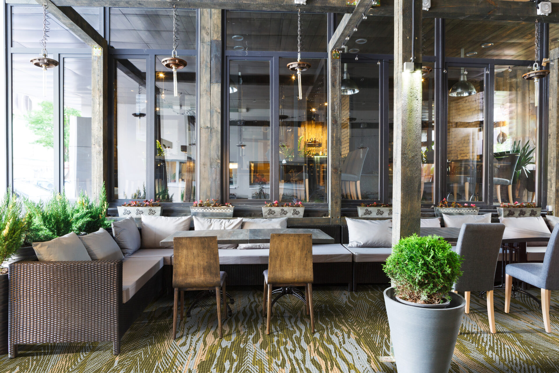 Interior of cozy restaurant. Contemporary design in loft style, modern dining place and bar counter, copy space