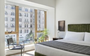 view from bed in aparthotel ROOST Washington DC with city view
