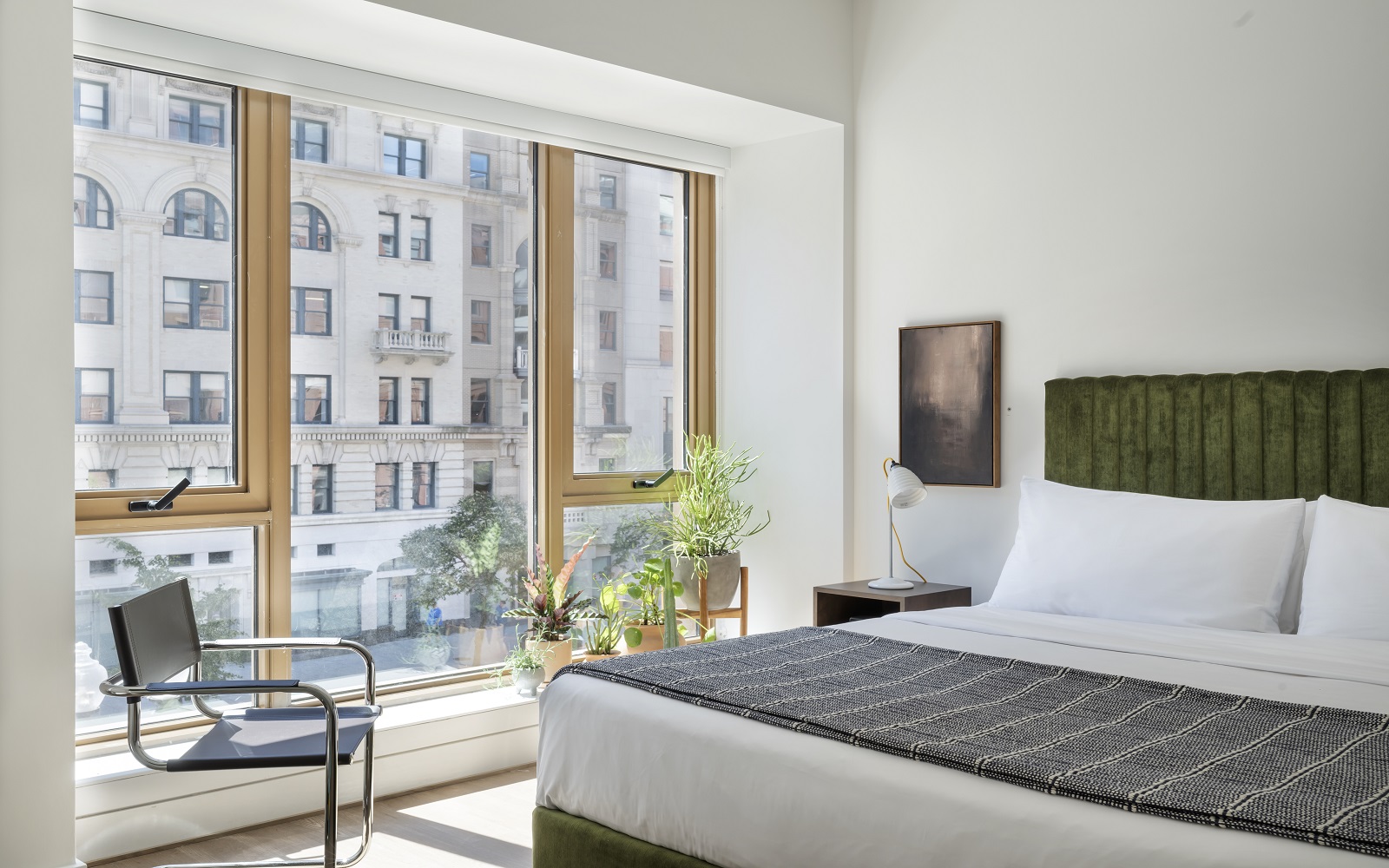 view from bed in aparthotel ROOST Washington DC with city view