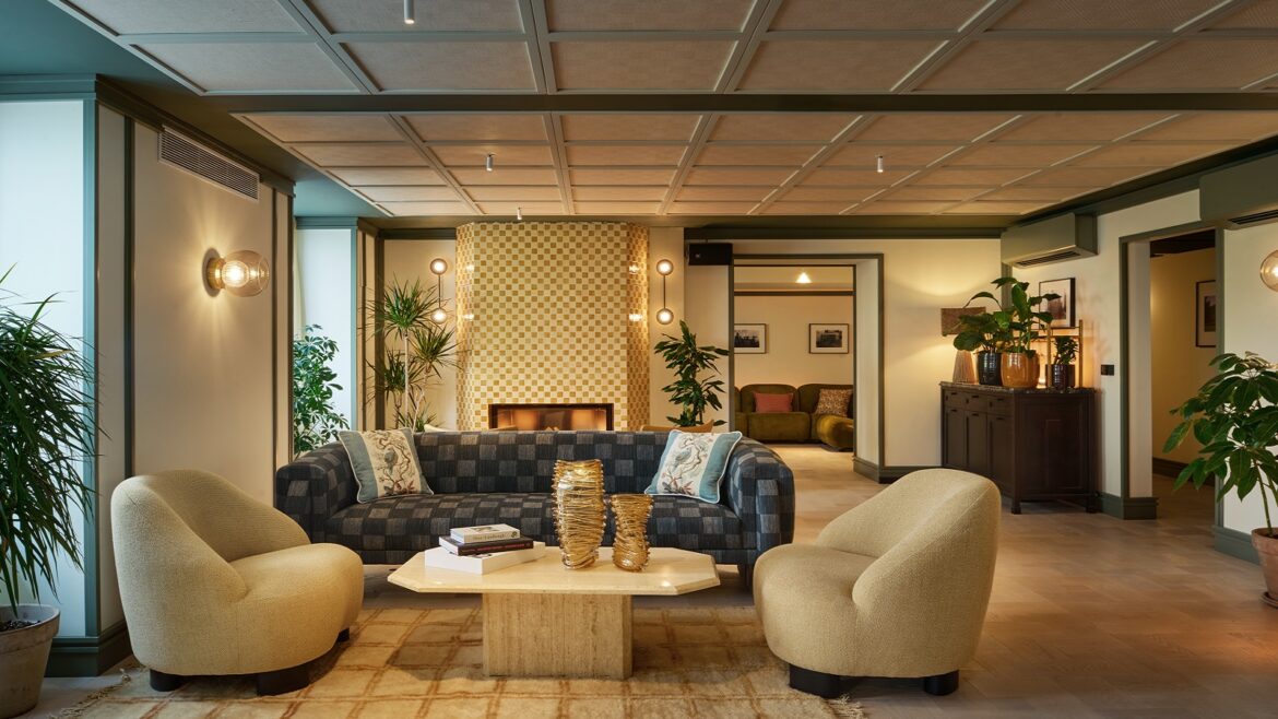 tub chairs and sofa around coffee table in The Cover Vienna