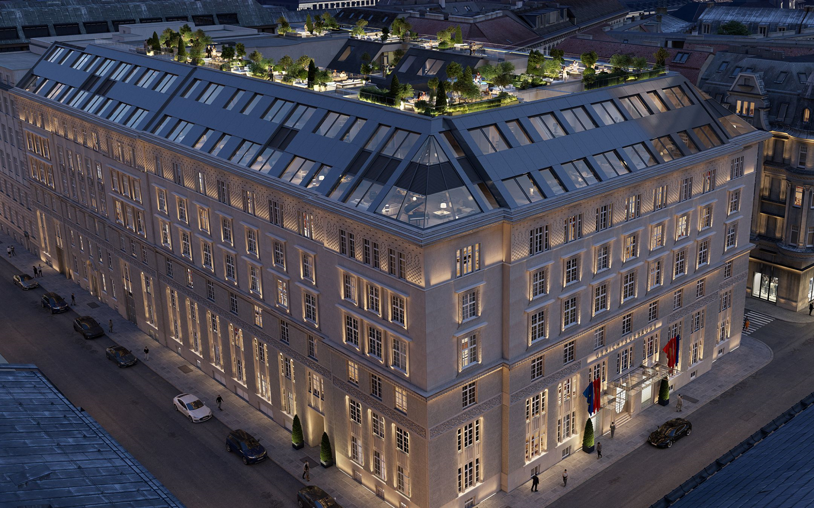 night view of facade of Mandarin Oriental Vienna with lighting on rooftop terrace