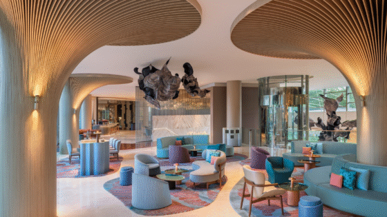 lobby with blue furniture and lily pad columns in Sentosa Cove as it lifts the curtain on its newly reimagined rooms and suites