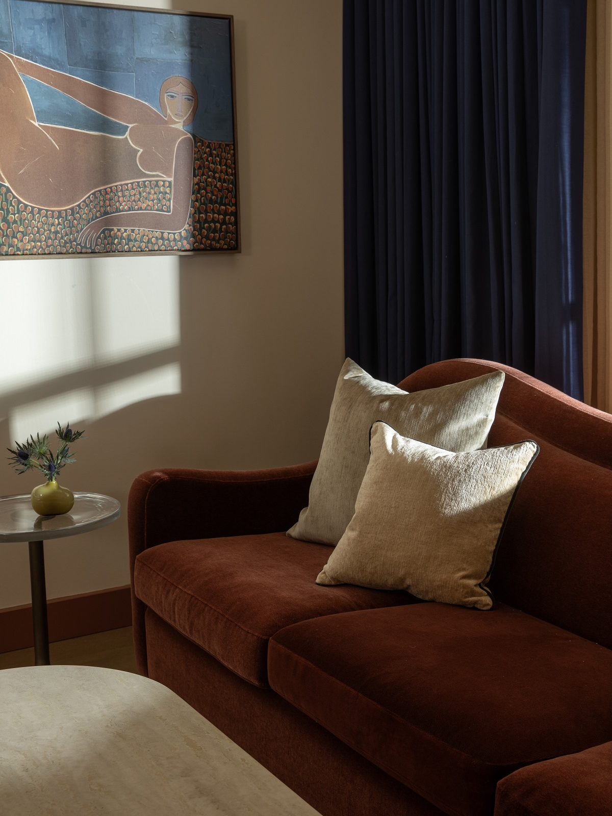 morning light on chair, cushion and art in Hotel Daphne Houston from Bunkhouse