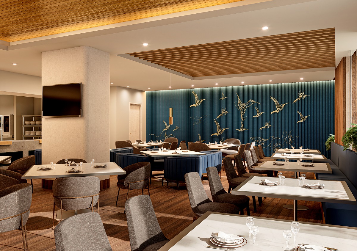 voco restaurant with humming bird motif repeated in mural on back wall