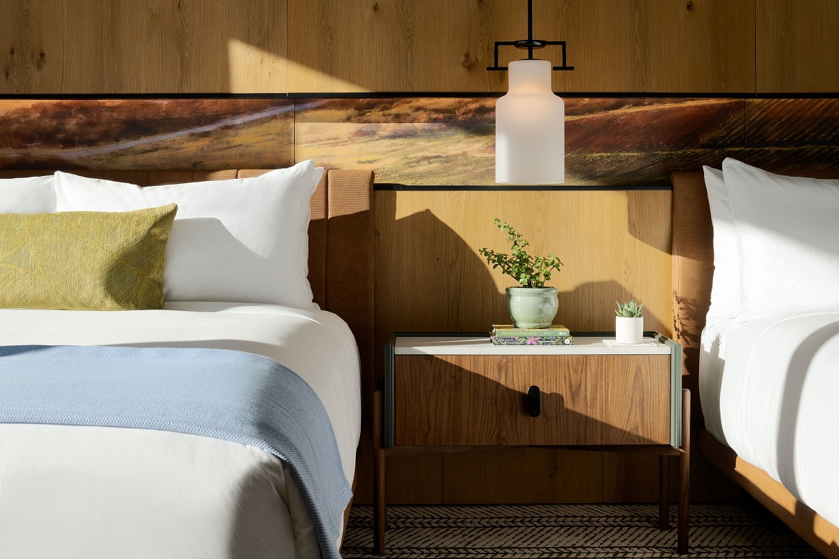 bedroom detail in Appellation Healdsburg with natural wood surfaces and white linen