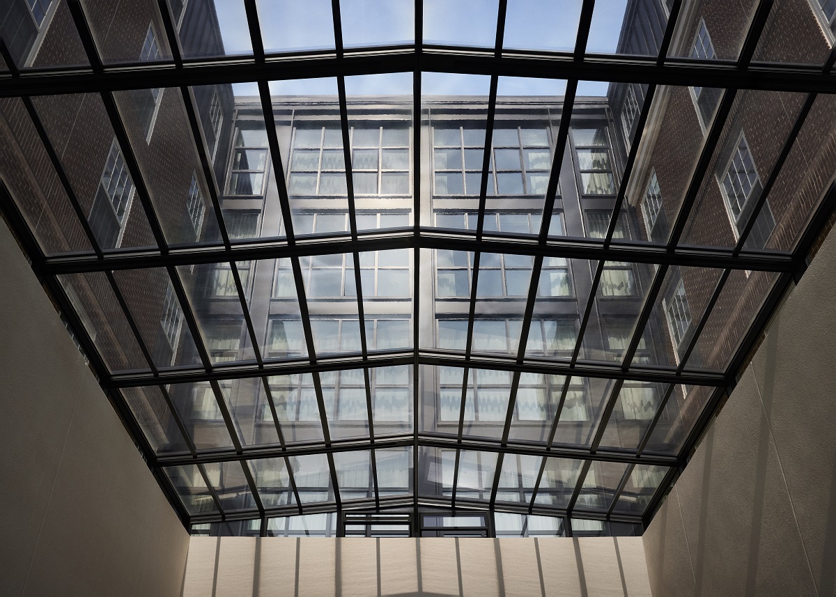 aluminium framed glass ceiling in entrance to Graduate Princeton hotel designed by Stonehill Taylor