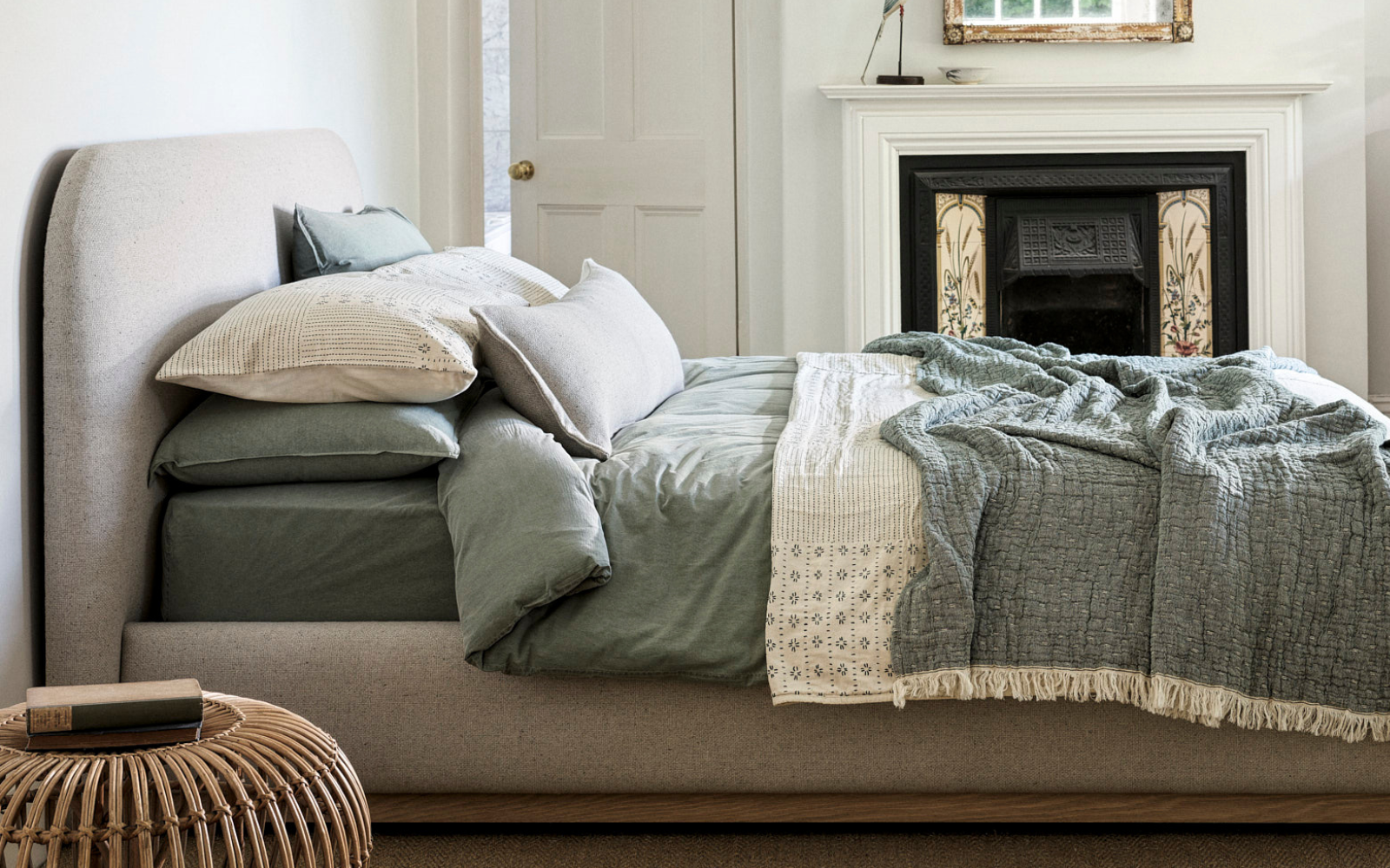 Halstock bed from Naturalmat covered in new upholstery fabric ReNew in oat colour.